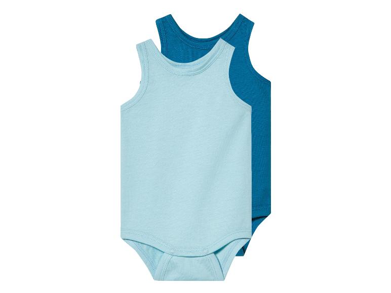 Deux bodies bébé, bleu clair et bleu foncé.