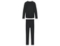 Un ensemble de sous-vêtements thermiques noir comprenant un t-shirt à manches longues et un pantalon long.