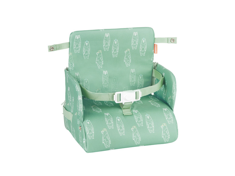 Une chaise haute verte à imprimé ours de BabyBjörn.