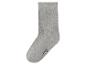 Chaussette grise côtelée avec le numéro 27-30 sur la pointe