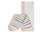 Collants blancs et roses à rayures pour bébés.