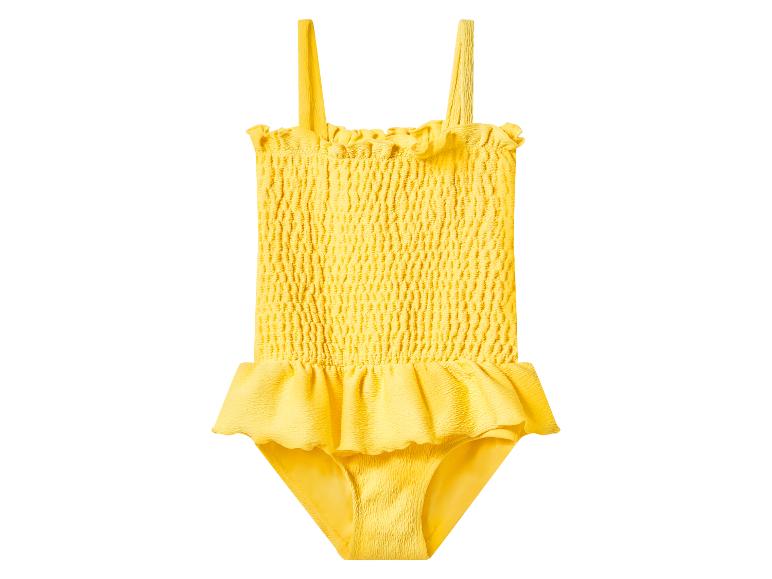 Maillot de bain jaune pour enfant avec volants et détails smockés.