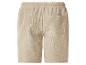 Short de survêtement beige avec taille élastique et poche arrière.