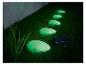 Pierres lumineuses solaires vertes pour jardin.