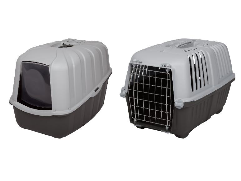 Deux cages de transport pour animaux, une avec un rabat transparent et une avec une porte grillagée, en gris et gris foncé.