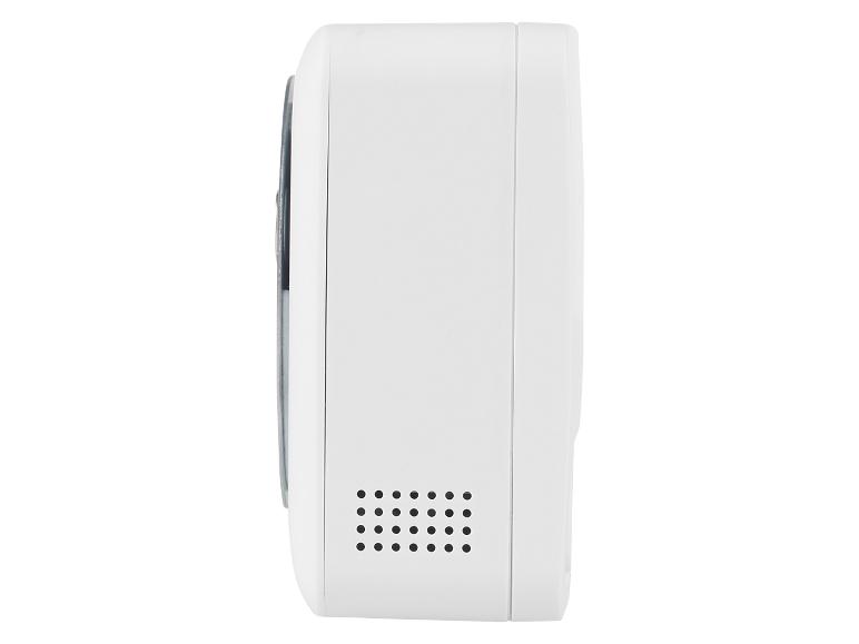 Appareil électronique blanc avec grille de ventilation, vu de côté.