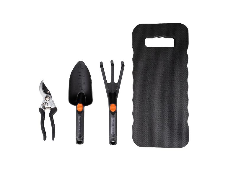 Ensemble d'outils de jardinage: sécateur, transplantoir, râteau et coussin de jardinage.