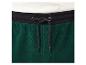 Pantalon de survêtement vert foncé avec un cordon et une ceinture noire.