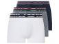 Trois boxers en blanc, gris et bleu marine avec un liseré rouge