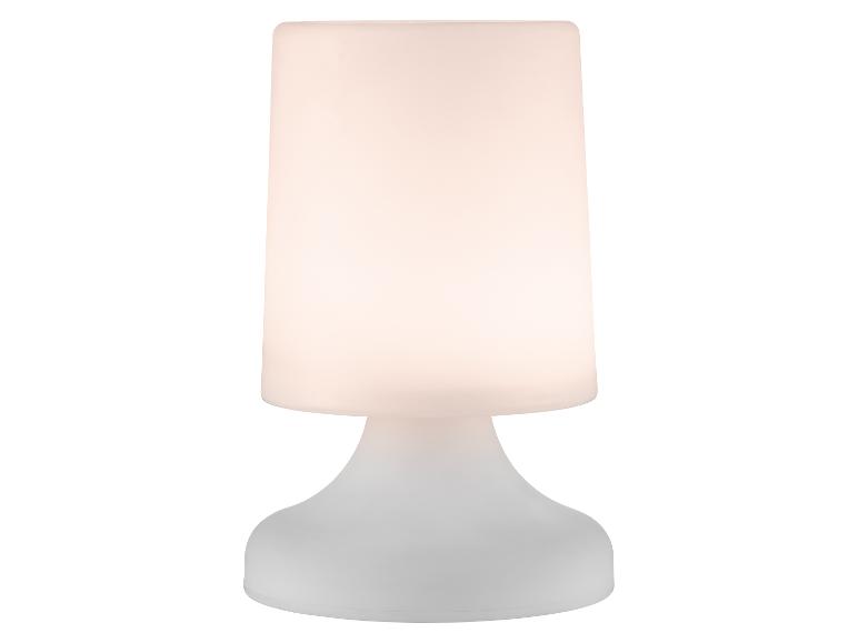 Lampe de table blanche avec un abat-jour cylindrique lumineux et une base arrondie.