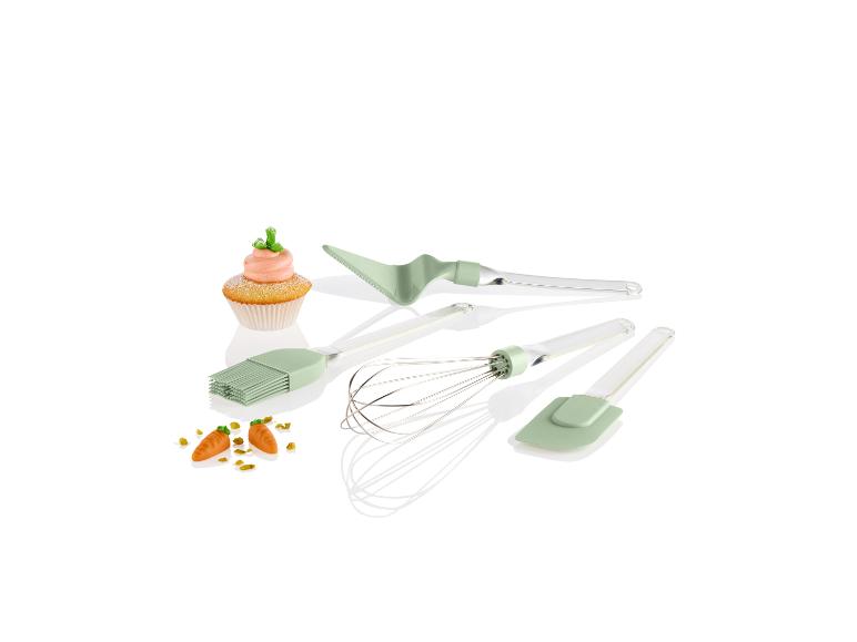 Ustensiles de cuisine : spatule, fouet, pinceau et cupcake.