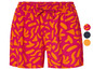 Un short rose avec un motif abstrait orange.