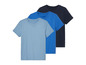 Trois t-shirts unis en bleu clair, bleu foncé et bleu.