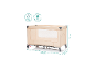 Lit de voyage beige avec dimensions (125x65x76 cm) et poids maximum (15 kg bébé, 8 kg accessoires).