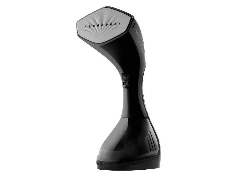 Un fer à repasser à vapeur noir avec une plaque chauffante