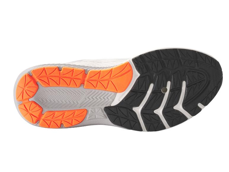 Semelle d'une chaussure de course à pied avec un motif noir et orange.
