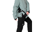 Personne portant une veste de ski vert menthe et un pantalon de ski noir.