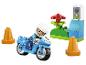 Moto de police bleue LEGO® DUPLO® avec figurine et cônes.