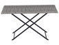 Une table pliante en osier avec un cadre en métal noir.