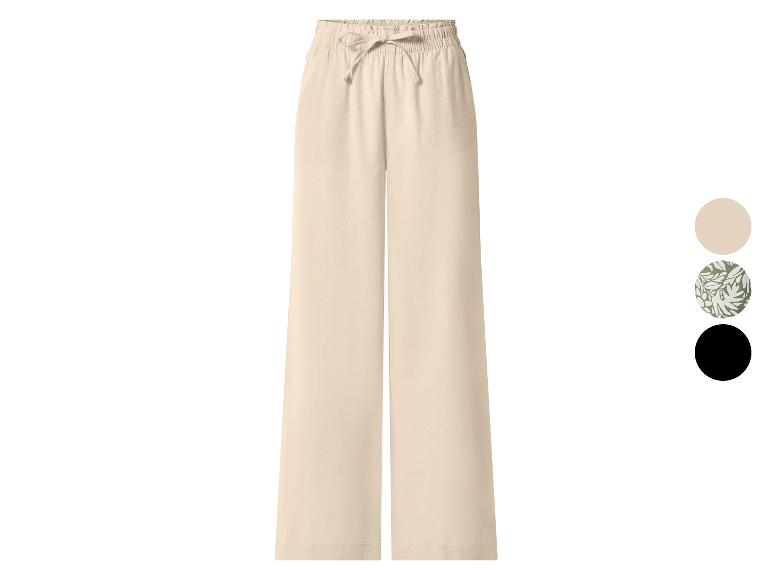 Pantalon large beige avec cordon de serrage à la taille, disponible en trois couleurs.