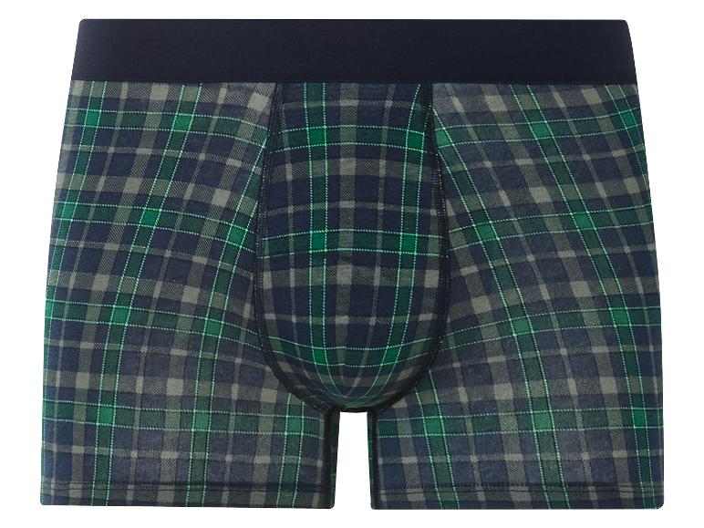 Boxers bleus à carreaux vert et blanc.