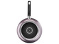 Une poêle Tefal avec un fond noir détaillé.