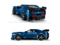 Lego Ford Mustang Shelby GT500, bleu avec des détails noirs et une minifigure.