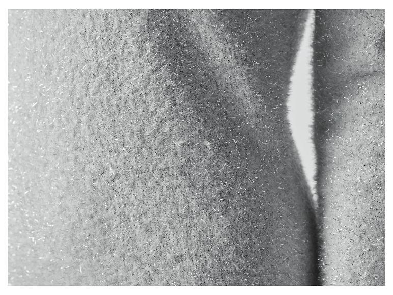 Gros plan d'un tissu pailleté argenté