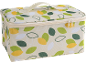 Sac isotherme avec motif de feuilles dans les tons vert, jaune et blanc