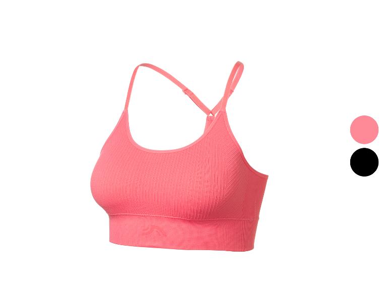 Soutien-gorge de sport rose côtelé avec bretelles réglables.