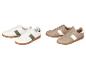 Deux paires de baskets : blanches à rayures vertes et beiges à rayures blanches.