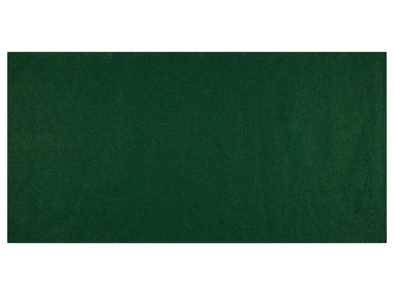 Tapis vert foncé à texture douce