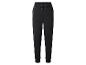 Pantalon de survêtement noir pour femme avec cordon de serrage et chevilles resserrées.