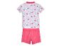 Maillot de bain deux pièces fille : haut imprimé papillons et bas rose.