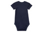 Un body bébé bleu marine à manches courtes.