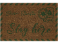 Paillasson avec l'inscription « Dear Santa, Stay here » et motifs de Noël.