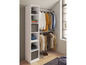 Une armoire blanche avec des étagères et une barre de penderie, pleine de vêtements.