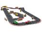 Circuit de course en bois avec des voitures et des figurines.
