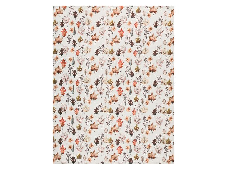 Motif d'automne avec des feuilles et des fleurs aux tons chauds.
