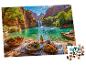 Puzzle avec une table de pique-nique près d'une cascade et d'un lac turquoise.