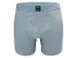 Caleçon boxer homme bleu clair avec une étiquette foncée sur la ceinture.