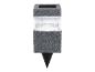 Lampe de jardin solaire avec surface grise granuleuse et partie lumineuse transparente nervurée, avec piquet.