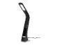 Une lampe de bureau noire avec un éclairage LED et une station de charge pour smartphones.