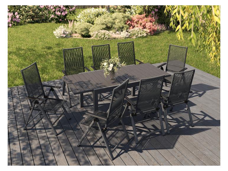 Ensemble table et chaises de jardin en aluminium gris foncé.