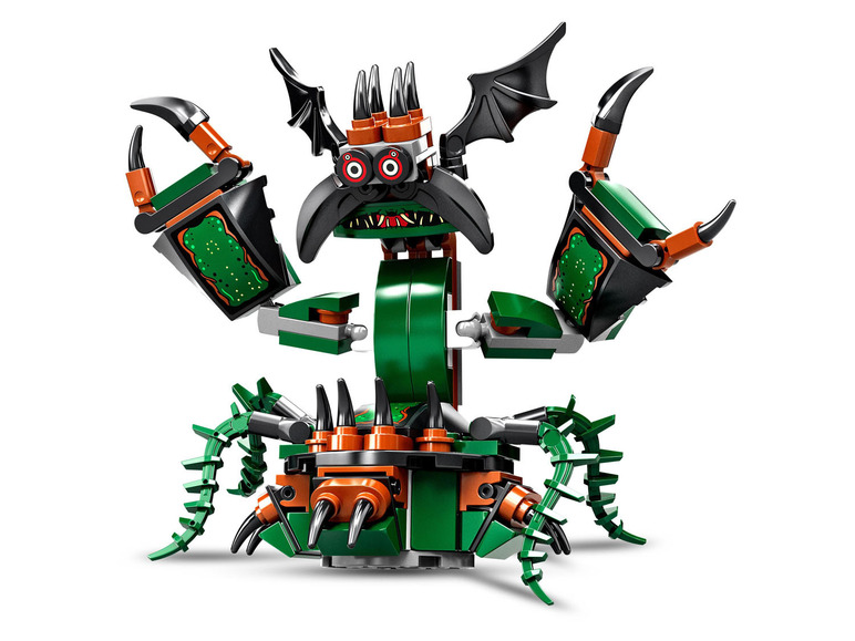 Un ensemble de construction LEGO d'un monstre vert avec des griffes, des ailes et des épines.