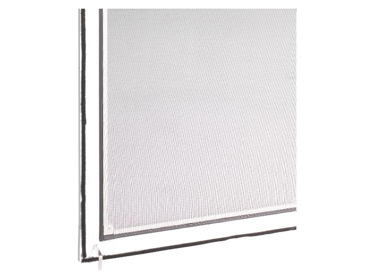 Une porte moustiquaire blanche avec un cadre noir.