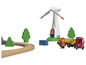 Un moulin à vent, un camion, des figurines et des rails de train BRIO.