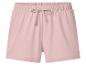 Shorts de sport roses pour femmes avec taille élastique et cordon de serrage.