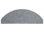 Un paillasson gris en demi-cercle.