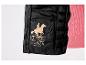 Une veste noire U.S. Grand Polo Equipment & Apparel avec un logo de cavalier.
